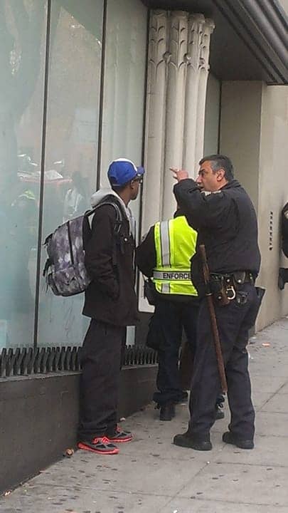 SFPD-Off.-Carrasco-issues-Muni-fare-evasion-citation-Geary-Van-Ness-0114-web, The rich ride for free, the po’ get po’liced: Mayor Lee orders Muni sweeps, Local News & Views 