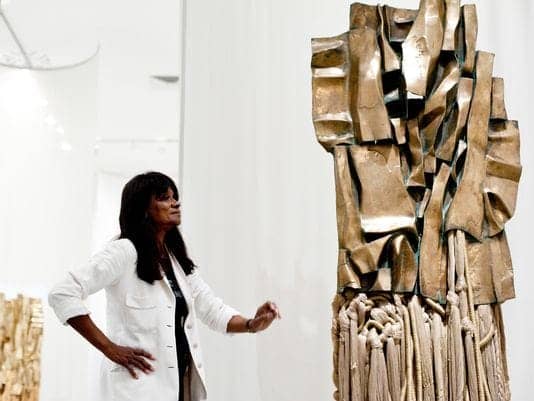 Barbara-Chase-Riboud-with-‘Malcolm-X-3’-1969-by-Barbara-Chase-Riboud-polished-bronze-cotton-and-rayon-at-Philadelphia-Museum-of-Art-by-Gannett-Courier-Post, Wanda’s Picks for April 2014, Culture Currents 