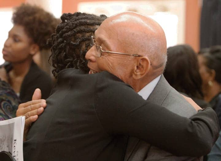 Kevin-Westons-Memorial-Service-Willie-hugging-Lateefah-Delancey-St.-062814-by-Malaika-web, Kevin Weston, maker of media-makers, Local News & Views 
