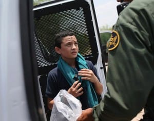Honduran-refugee-boy-questioned-detained-0714-300x237, Child refugees: When children are ‘the enemy’, World News & Views 
