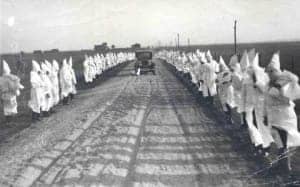 Ku-Klux-Klan-grew-in-Okla-after-Tulsa-Race-Riot-Black-Wall-Street-Drumright-Okla-1922-by-Tulsa-Historical-Society-300x187, Survivors of Black Wall Street race riot still haven’t received any reparations, News & Views 