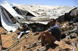 Palestinian-man-sits-on-ruins-of-his-farm-after-Israeli-bombing-Gaza-City-070914-by-Mohammed-Omer-300x199, Gaza: Nowhere to run, World News & Views 