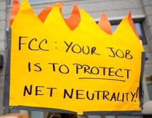 FCC-your-job-is-to-protect-Net-Neutrality-0514-by-Bloomberg-300x232, The battle for Net Neutrality: an interview wit’ journalist Davey D, News & Views 