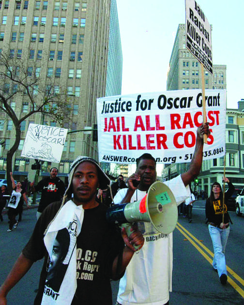 Oakland-Oscar-Grant-Rebellion-JR-marching-011409-by-Bill-Hackwell-web, To win justice for Michael Brown, send the Black press to Ferguson, Missouri, News & Views 
