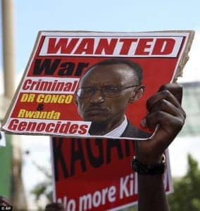Kagame-‘Wanted-War-Criminal’-Rwanda-Day-protest-London-2012-284x300, Rwanda Day: Black faces of empire, World News & Views 