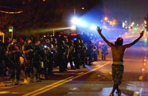 Michael-Brown-rebellion-protester-hands-up-defies-militarized-cops-Ferguson-081914-by-Xinhua-News-Agency-300x196, Let’s talk about Ferguson, News & Views 