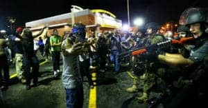 Michael-Brown-rebellion-youth-confront-crazy-cops-W.-Florissant-Ave.-082014-by-Curtis-Compton-Atlanta-Journal-Constitution-300x157, Ten illegal police actions to watch for in Ferguson, News & Views 