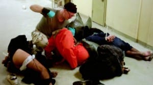 Charles-Graner-beats-prisoners-at-Abu-Ghraib-300x168, Nurse fired for speaking out: ‘I am on a mission to stop torture at CDCR’, Behind Enemy Lines 