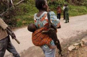 Congo-mom-w-baby-weapon-300x199, Tired of being gang raped, Congo mother takes up weapon, World News & Views 