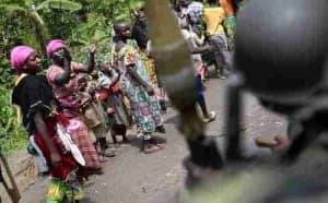 Congolese-cheer-army-for-defeating-M23-1113-by-AP-300x186, Tired of being gang raped, Congo mother takes up weapon, World News & Views 