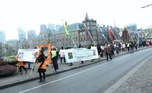 March-to-support-Victoire-Ingabire-end-Kagame’s-requested-deportations-The-Hague-112914-300x184, Rwandans protest Dutch support for Kagame dictatorship, World News & Views 