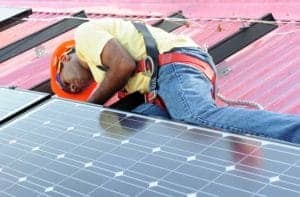 Black-man-installs-solar-panels-on-own-home-300x197, Making money with solar, Local News & Views 