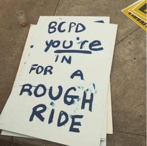 BCPD-youre-in-for-a-rough-ride-Freddie-Gray-protest-sign-042515-Baltimore-by-Christopher-Mathias-Huff-Post-300x298, Baltimore ‘shuts it down’ for Freddie Gray, News & Views 