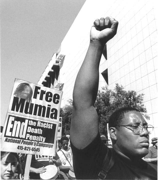 Free-Mumia-protest, Mumia’s life is in danger; only the people can save him – keep calling!, Behind Enemy Lines 