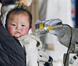 Fukushima-child-checked-for-signs-of-radiation-36-percent-have-abnormal-thyroid-growths-0712-by-Kyodo-Reuters-300x254, Less than one lifetime: Eyewitness to nuclear development, from Hunters Point to Chernobyl and Fukushima, issues a warning, World News & Views 