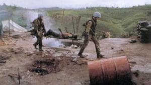 Kibeho-Massacre-UN-troops-carry-victim-SW-Rwanda-042295-by-George-Gittoes-300x169, Rwanda: No justice for Kibeho Massacre victims 20 years later, World News & Views 