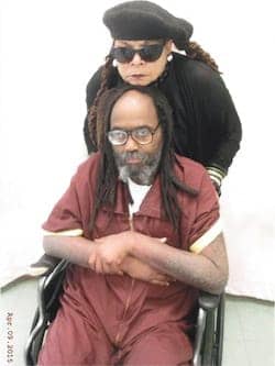 Mumia-Abu-Jamal-in-wheelchair-Wadiya-Jamal-visit-0409151, The public execution of Mumia Abu-Jamal?, Abolition Now! 