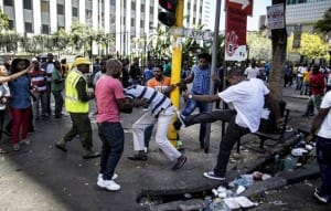 Xenophobic-attack-on-taxi-driver-Johannesburg-Central-Business-District-041515-by-Marco-Longari-300x191, South African shack dwellers condemn xenophobia: ‘Our African brothers and sisters are being openly attacked’, World News & Views 