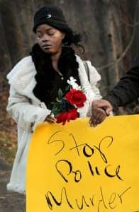 Cleveland-PD-murder-of-Malissa-Williams-Timothy-Robinson-protested-by-Malissa’s-cousin-Aretha-Robinson-120312-by-Lynn-Ischay-Cleveland-Plain-Dealer-196x300, 137 shots: Cleveland killer cop acquitted in murder of Timothy Russell and Malissa Williams, News & Views 