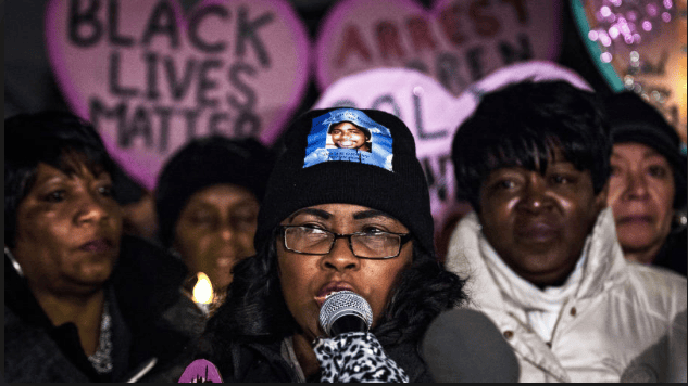 Rev.-Wanda-Johnson-Oscar-Grants-mother-speaks-at-Code-Pink-Justice-Dept-rally-DC-1214-by-J.-Lawler-Duggan, After Baltimore, mothers of police murder victims issue a call to reclaim Mother’s Day, News & Views 
