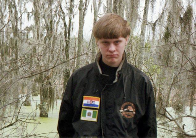 Dylann-Storm-Roof-wears-apartheid-South-Africa-Rhodesia-flags-on-jacket-FB1, White terrorist slays nine in Charleston church founded by Denmark Vesey on anniversary of his 1822 rebellion, News & Views 