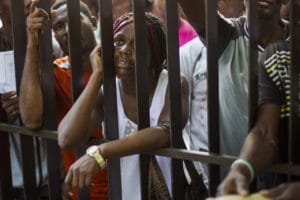 Haitians-line-up-to-legalize-status-before-midnight-deadline-Santo-Domingo-DR-061715-1-by-Erika-Santelices-AFP-web-300x200, The tragic, bloody origins of the Dominican Republic’s plan to erase much of its Black population, World News & Views 