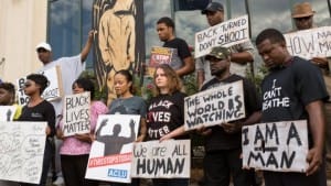 North-Charleston-protests-murder-of-Walter-Scott-by-Off.-Michael-Slager-City-Hall-040815-by-Richard-Ellis-AFP-300x169, Fifteen most outrageous responses by police after killing unarmed people, News & Views 