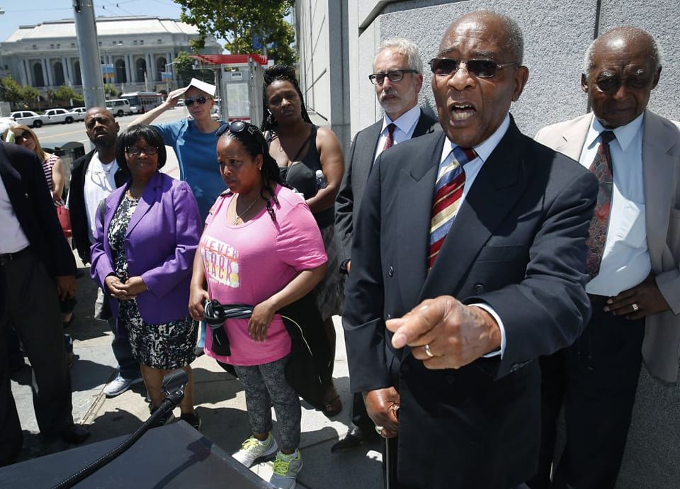 Rev.-Dr.-Amos-Brown-speaks-press-conf-outside-SF-Superior-Ct-against-FD-Haynes-Gardens-sale-to-speculators-072815-by-Paul-Chinn-SF-Chronicle, Third Baptist Church sues to keep 104 families in their affordable F.D. Haynes Gardens homes, Local News & Views 