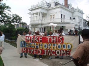 Survivor-Village-protest-on-St.-Charles-Ave-near-Tulane-‘Make-this-neighborhood-mixed-income’-2006-by-Indymedia-web-300x225, New Orleans land grab: Addressing the ‘elephant’ in the city 10 years after Hurricane Katrina, News & Views 