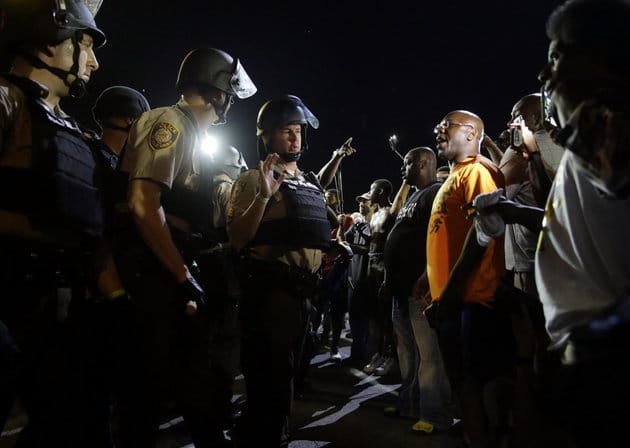 Mike-Brown-murder-anniversary-crowd-confronts-cops-Ferguson-080915, State of emergency declared in Ferguson as cops shoot Mike Brown’s friend on anniversary of the murder that sparked the movement, News & Views 