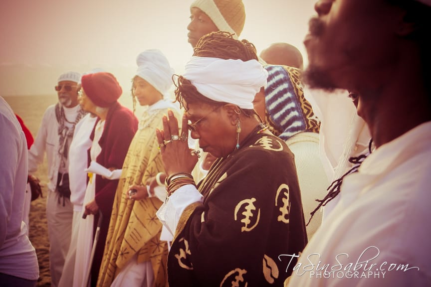 Maafa-elders-embrace-youth-concentric-circles-Sis.-Omitola-Akinwunmi-meditates-101115-by-TaSin-Sabir, Maafa 2015: We remember the ancestors, Culture Currents 
