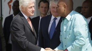 Bill-Clinton-shakes-hands-with-Haiti-Pres-Michel-Martelly-by-Andres-Martinez-Casares-Reuters-300x167, Democracy denied: US turning Haiti into another vassal state, World News & Views 