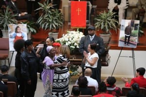 Mario-Woods-funeral-mourners-comfort-Gwen-Woods-Cornerstone-MBC-121715-by-Mike-Koozmin-SF-Examiner-300x200, The funeral of Mario Woods and the execution of African American youth, Local News & Views 