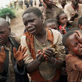 Rwandan-refugee-children-plead-to-cross-bridge-to-Zaire-during-1994-genocide-by-AP, Rwanda, the enduring lies: a Project Censored interview with Professor Ed Herman, World News & Views 