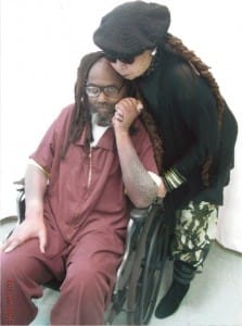 Wadiya-Jamal-hugs-Mumia-in-wheelchair-w-skin-rash-040915-223x300, Mumia’s fight for medical treatment, Abolition Now! 