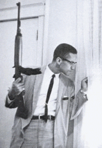 Malcolm-X-armed-looks-out-window-208x300, On self-defense against racist murder, Culture Currents 