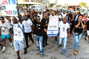 Ethiopian-Israelis-protest-police-terror-carry-coffin-w-Israeli-flag-list-of-grievances-070316-by-Benny-Woodoo-300x199, Ethiopians protest in Israel, call for end to state racism and police violence, World News & Views 