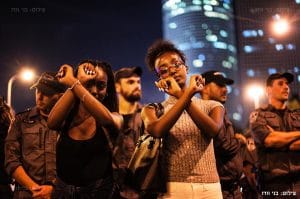 Ethiopian-Israelis-protest-police-terror-cross-arms-against-infringements-on-freedom-070316-by-Benny-Woodoo-300x199, Ethiopians protest in Israel, call for end to state racism and police violence, World News & Views 