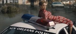 Beyonce-on-New-Orleans-Police-car-in-flood-Formation-0216-300x136, Police run feel-good PR campaign while criminalizing Black August, Local News & Views 
