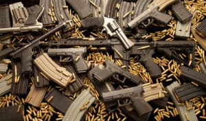 Hand-guns-ammo-web-300x176, Is the U.S. government dumping guns in the hood?, News & Views 
