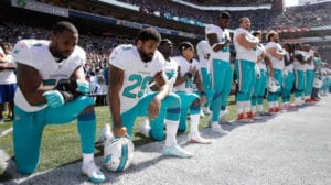 Kaepernick-solidarity-4-Miami-Dolphins-kneel-nat’l-anthem-game-against-Seattle-Seahawks-091116-by-Stephen-Brashear-AP-300x168, Solidarity with Kaepernick ripples through the NFL on Sept. 11, News & Views 