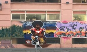 Colin-Kaepernick-mural-15th-Mission-1016-by-Meaghan-M.-Mitchell-Hoodline-300x181, The ‘woke tailgate’: The brave of Buffalo kneel in solidarity with Colin Kaepernick, News & Views 