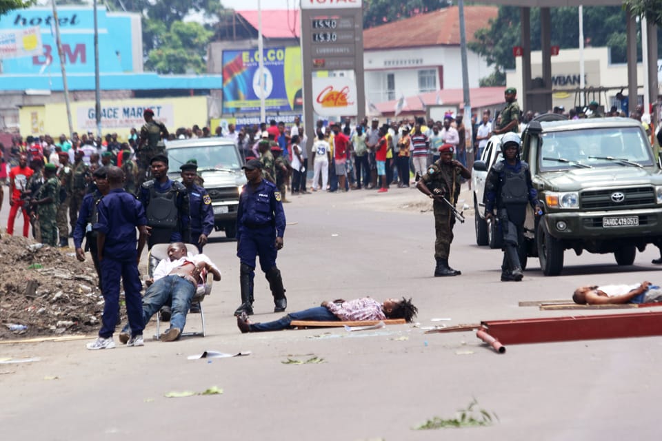 Congolese-protest-election-delay-bodies-lie-in-street-Kinshasa-901916-by-John-Bompengo-AP, Countdown to Congo’s election: A tale of youth power and a regime decline, World News & Views 