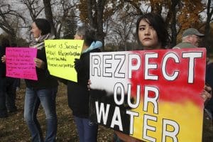 Standing-Rock-member-Holly-Doll-of-Mandan-protests-state-capitol-Bismarck-102916-by-John-L.-Mone-AP-300x200, Standing Rock: We are here to protect the water – because we all live downstream – but does eviction loom?, News & Views 