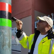Tyson-of-SF-Public-Works-paints-red-black-green-stripes-on-3rd-St-poles-012917-by-Barbara-Gratta-Gratta-Wines-184x184, Third Street poles get red, black & green stripes in honor of Bayview’s Black heritage, Local News & Views 