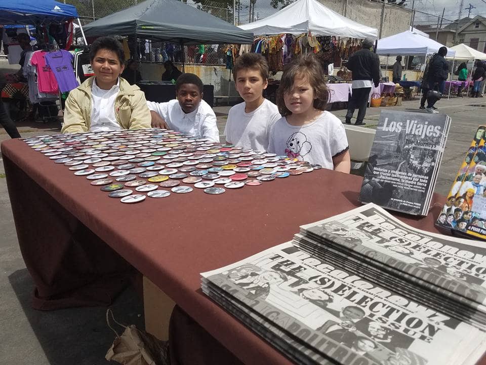 Youth-skolaz-Kimo-Tibu-Tyray-Amir-Cheyanne-sell-Decolonewz-at-Malcolm-X-Day-Oakland-by-PNN, Profiled by BART cops for being a good son, Local News & Views 
