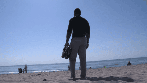 Pass-Interference-Davone-Bess-at-beach-300x169, ‘Pass Interference: The Davone Bess story’ tackles mental illness in NFL at SF Black Film Fest, Culture Currents 