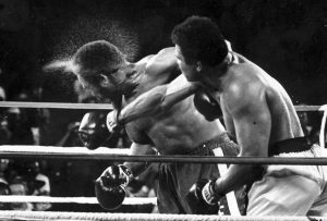 Rumble-in-the-Jungle-Muhammad-Ali-beats-George-Foreman-103074-web-300x203, TKO! Dismantling the racist machine: Ward crushes Kovalev to retain the unified light heavyweight boxing title, Culture Currents 
