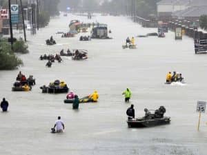 Hurricane-Harvey-Houstonians-save-each-other-small-boats-in-flooded-street-081817-by-David-J.-Phillip-AP-300x225, Wanda’s Picks for September 2017, Culture Currents 