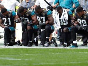 Jacksonville-Jaguars-lock-arms-kneel-before-NFL-game-against-Baltimore-Ravens-at-Wembley-Stadium-London-092417-by-Paul-childs-Action-Images-Reuters-300x225, For the NFL, it was ‘Choose your side Sunday’, News & Views 